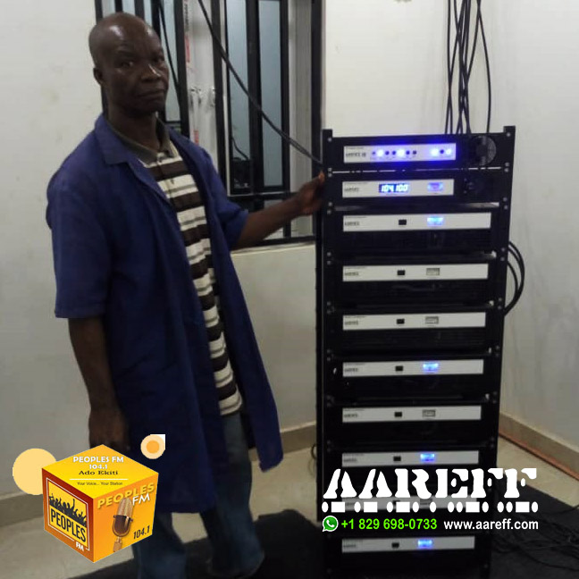 The engineer of Peoples FM standing proud in front of the new Aareff Transmission System